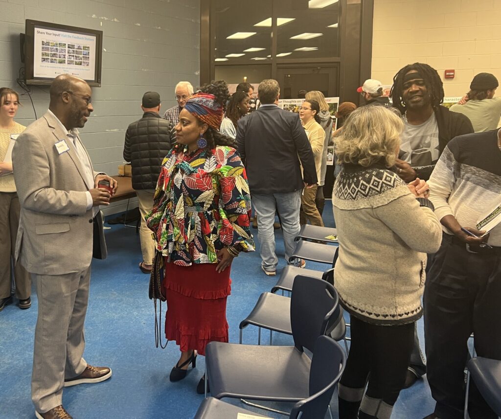 Community members mingling at our Community Kickoff Meeting in late January.